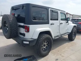 2018 Jeep Wrangler Unlimited Sahara with VIN 1C4HJWEG1JL801934, listed as a IAAI auction lot 42072968 with 112,432 mi miles and . Bid and sale history available at DreamBid. Image 4.