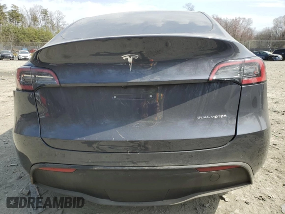 2022 Tesla Model Y Long Range with VIN 7SAYGDEE5NF366493, listed as a Copart auction lot 49874975 with 66,925 mi miles and Salvage Title. Bid and sale history available at DreamBid. Image 6.
