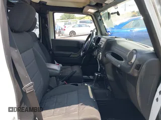 2012 Jeep Wrangler Unlimited Sport with VIN 1C4BJWDG7CL273102, listed as a IAAI auction lot 42288975 with 155,153 mi miles and . Bid and sale history available at DreamBid. Image 5.