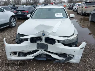 2014 BMW 3 Series 328i xDrive with VIN WBA3B5G50ENS06304, listed as a IAAI auction lot 41402704 with 139,943 mi miles. Bid and sale history available at carsss.com. Image 12.