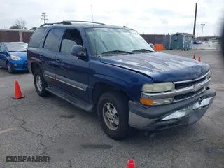 2003 Chevrolet Tahoe LS with VIN 1GNEC13T73R263893, listed as a IAAI auction lot 41906772 with 211,759 mi miles. Bid and sale history available at carsss.com. Image 1.