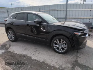 2021 Mazda CX-30 Select z VIN 3MVDMBBL4MM317712, wystawiony jako Copart lot #56322775 z przebiegiem 31 962 mil mil oraz Szkoda całkowita • Salvage title. Historia ofert i sprzedaży dostępna na DreamBid. Obrazek 4.