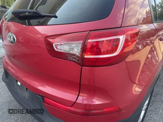 2013 Kia Sportage LX with VIN KNDPB3A26D7461145, listed as a IAAI auction lot 42769820 with 166,032 mi miles and . Bid and sale history available at DreamBid. Image 6.