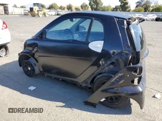2009 Smart fortwo Pure z VIN WMEEJ31X49K253051, wystawiony jako Copart lot #70193934 z przebiegiem Nie podano mil oraz Szkody całkowita. Historia ofert i sprzedaży dostępna na DreamBid. Obrazek 2.