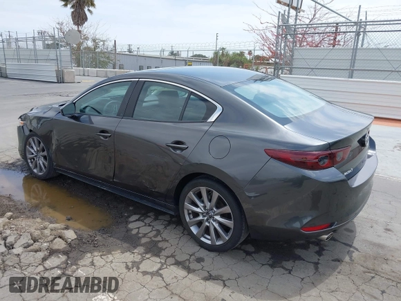 2021 Mazda 3 Preferred with VIN 3MZBPACL4MM214814, listed as a IAAI auction lot 42115140 with 28,860 mi miles and . Bid and sale history available at DreamBid. Image 3.