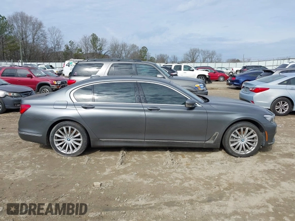2017 BMW 7 Series 740i with VIN WBA7E2C54HG740170, listed as a IAAI auction lot 41432578 with 110,893 mi miles and . Bid and sale history available at DreamBid. Image 13.