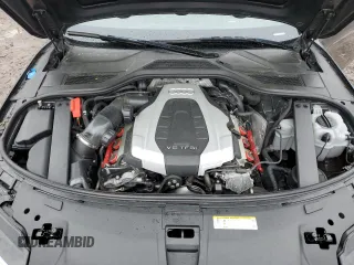 2017 Audi A8 z VIN WAU44AFD0HN004258, wystawiony jako Copart lot #55283985 z przebiegiem 128 059 mil mil oraz Szkoda całkowita • Salvage title. Historia ofert i sprzedaży dostępna na DreamBid. Obrazek 11.