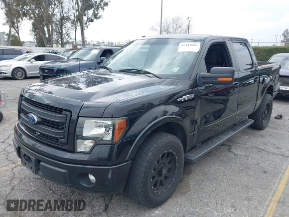 2014 Ford F-150 XL with VIN 1FTFW1CF0EFA45457, listed as a IAAI auction lot 41447000 with 169,984 mi miles and . Bid and sale history available at DreamBid. Image 2.