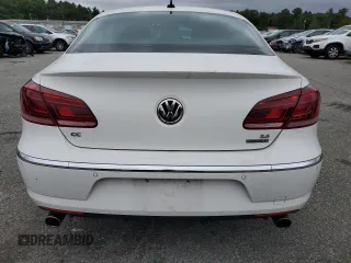 2014 Volkswagen CC VR6 Executive 4Motion with VIN WVWGU7AN2EE523987, listed as a Copart auction lot 71685214 with 77,732 mi miles and Salvage Title. Bid and sale history available at carsss.com. Image 6.