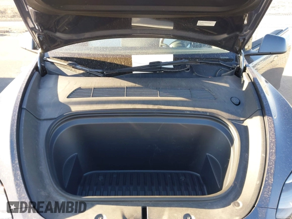 2023 Tesla Model Y Long Range with VIN 7SAYGAEEXPF714760, listed as a IAAI auction lot 41748398 with 49,802 mi miles and . Bid and sale history available at DreamBid. Image 10.