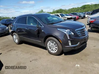 2018 Cadillac XT5 AWD with VIN 1GYKNBRS8JZ203963, listed as a Copart auction lot 57243165 with 18,407 mi miles and Salvage title. Bid and sale history available at DreamBid. Image 4.