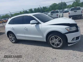 2014 Audi Q5 Premium Plus z VIN WA1CMAFP9EA041976, wystawiony jako IAAI lot #42296067 z przebiegiem 131 906 mil mil oraz . Historia ofert i sprzedaży dostępna na DreamBid. Obrazek 13.