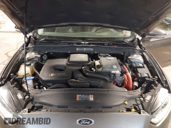2013 Ford Fusion Titanium Hybrid with VIN 3FA6P0RU6DR319586, listed as a IAAI auction lot 42138979 with 125,388 mi miles. Bid and sale history available at carsss.com. Image 10.