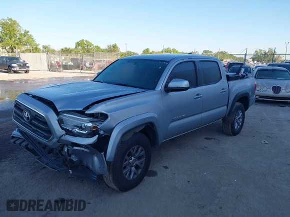 2017 Toyota Tacoma SR5 z VIN 5TFAZ5CN3HX024083, wystawiony jako IAAI lot #41739213 z przebiegiem 111 226 mil mil oraz . Historia ofert i sprzedaży dostępna na DreamBid. Obrazek 17.