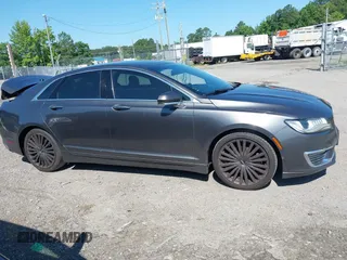 2017 Lincoln MKZ Reserve z VIN 3LN6L5E98HR653592, wystawiony jako IAAI lot #42531248 z przebiegiem 114 188 mil mil oraz . Historia ofert i sprzedaży dostępna na DreamBid. Obrazek 13.