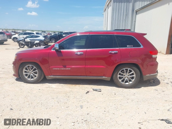 2014 Jeep Grand Cherokee Summit with VIN 1C4RJFJT1EC237358, listed as a IAAI auction lot 42602245 with 106,821 mi miles and . Bid and sale history available at DreamBid. Image 14.