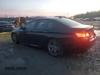 2016 BMW 5 Series 550i xDrive with VIN WBAKP9C52GD981190, listed as a Copart auction lot 85248244 with 90,962 mi miles and Salvage title. Bid and sale history available at DreamBid. Image 2.
