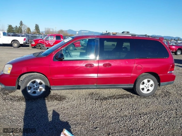 2005 Ford Freestar Wagon SES with VIN 2FMZA57645BA50977, listed as a IAAI auction lot 41540023 with 149,319 mi miles. Bid and sale history available at carsss.com. Image 14.