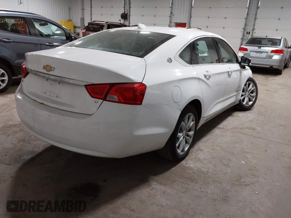 2018 Chevrolet Impala LT with VIN 1G1105S39JU135781, listed as a IAAI auction lot 41813394 with 100,747 mi miles and . Bid and sale history available at DreamBid. Image 4.