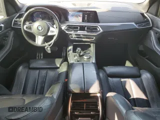 2019 BMW X5 xDrive40i with VIN 5UXCR6C50KLK86199, listed as a Copart auction lot 47523305 with 76,924 mi miles and Salvage Title. Bid and sale history available at DreamBid. Image 8.