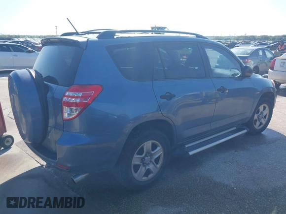 2009 Toyota RAV4 with VIN JTMZF33V49D008249, listed as a IAAI auction lot 41966740 with 214,352 mi miles. Bid and sale history available at carsss.com. Image 4.