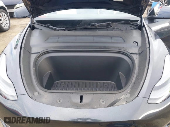 2024 Tesla Model Y with VIN 7SAYGDED8RF116209, listed as a IAAI auction lot 41761804 with 12,048 mi miles and . Bid and sale history available at DreamBid. Image 10.