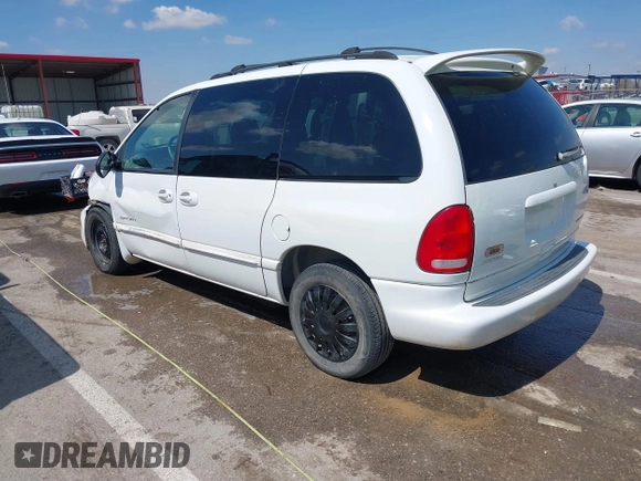 1999 Dodge Caravan z VIN 1B4GP45G2XB554868, wystawiony jako IAAI lot #41882038 z przebiegiem 130 743 mil mil oraz . Historia ofert i sprzedaży dostępna na DreamBid. Obrazek 3.