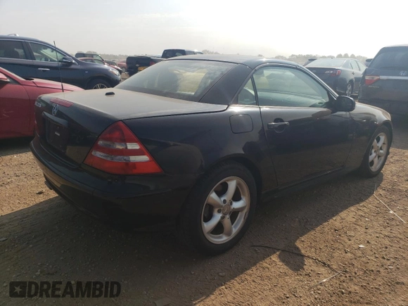 2003 Mercedes-Benz SLK 320 with VIN WDBKK65F43F284008, listed as a Copart auction lot 61010215 with 81,179 mi miles and Clean title. Bid and sale history available at DreamBid. Image 3.