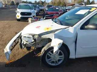 2004 Ford Focus SE with VIN 1FAFP34324W137459, listed as a IAAI auction lot 41634502 with 134,113 mi miles and . Bid and sale history available at DreamBid. Image 6.