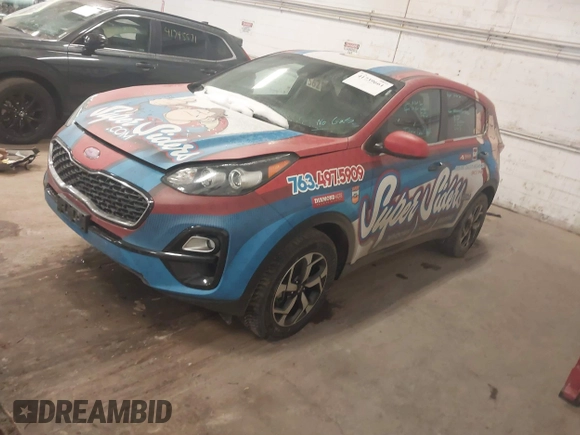 2021 Kia Sportage LX with VIN KNDPMCAC5M7843167, listed as a IAAI auction lot 41739661 with 138,372 mi miles and . Bid and sale history available at carsss.com. Image 2.