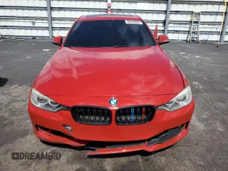 2013 BMW 3 Series 328i xDrive with VIN WBA3B3C5XDJ810958, listed as a Copart auction lot 60620005 with 143,589 mi miles and Salvage title. Bid and sale history available at DreamBid. Image 5.