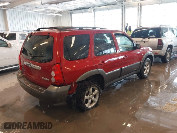 2006 Mazda Tribute S with VIN 4F2YZ06196KM14531, listed as a IAAI auction lot 41594920 with 297,204 mi miles and . Bid and sale history available at carsss.com. Image 4.
