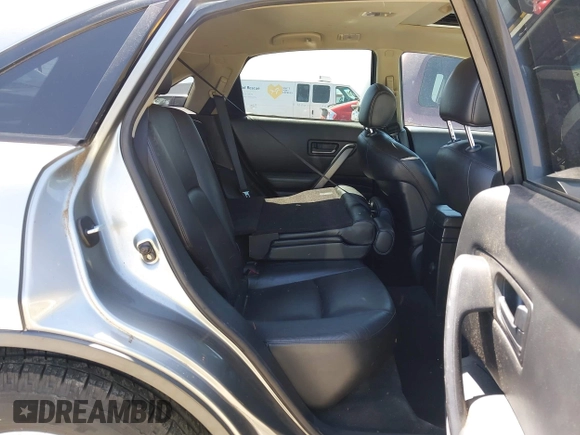 2005 Infiniti FX z VIN JNRAS08W05X216386, wystawiony jako IAAI lot #42346579 z przebiegiem 183 130 mil mil oraz . Historia ofert i sprzedaży dostępna na DreamBid. Obrazek 8.