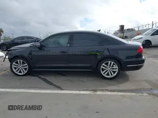 2019 Volkswagen Passat 2.0T Wolfsburg Edition with VIN 1VWLA7A34KC012887, listed as a IAAI auction lot 41792604 with 70,237 mi miles. Bid and sale history available at carsss.com. Image 15.