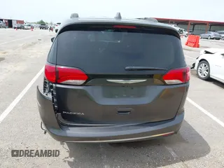 2017 Chrysler Pacifica Touring L with VIN 2C4RC1BG1HR540246, listed as a IAAI auction lot 42107768 with 151,268 mi miles and . Bid and sale history available at DreamBid. Image 16.