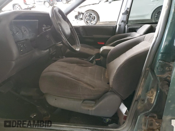 1996 Jeep Grand Cherokee Laredo with VIN 1J4GZ58S6TC304597, listed as a Copart auction lot 52962545 with Not provided miles and Salvage title. Bid and sale history available at DreamBid. Image 7.