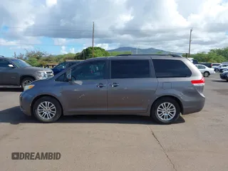 2014 Toyota Sienna XLE with VIN 5TDYK3DC2ES438980, listed as a IAAI auction lot 42067750 with 143,728 mi miles and . Bid and sale history available at DreamBid. Image 14.