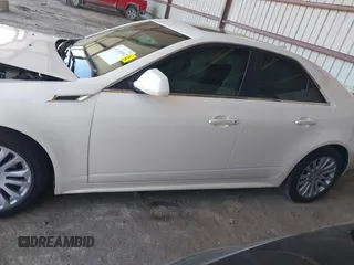 2013 Cadillac CTS Premium z VIN 1G6DS5E30D0105240, wystawiony jako IAAI lot #42145007 z przebiegiem 100 893 mil mil oraz . Historia ofert i sprzedaży dostępna na DreamBid. Obrazek 14.
