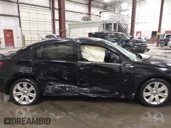 2014 Chrysler 200 Touring with VIN 1C3CCBBB3EN198117, listed as a IAAI auction lot 41999090 with 144,257 mi miles. Bid and sale history available at carsss.com. Image 13.