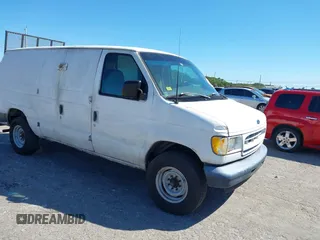 2002 Ford Econoline Cargo with VIN 1FTNE24242HB09306, listed as a IAAI auction lot 41597544 with 331,628 mi miles. Bid and sale history available at carsss.com. Image 1.