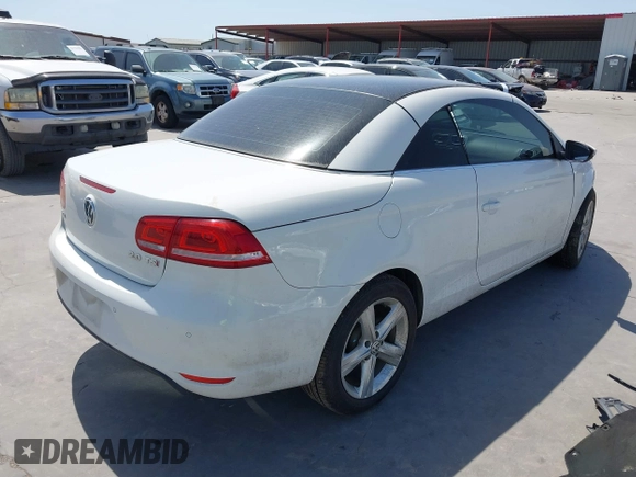 2012 Volkswagen Eos Executive with VIN WVWFW7AH9CV022169, listed as a IAAI auction lot 41795571 with 101,375 mi miles and . Bid and sale history available at DreamBid. Image 4.