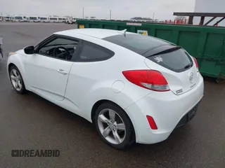 2013 Hyundai Veloster w/Gray Int with VIN KMHTC6AD8DU171050, listed as a IAAI auction lot 41992468 with 186,714 mi miles and . Bid and sale history available at DreamBid. Image 3.