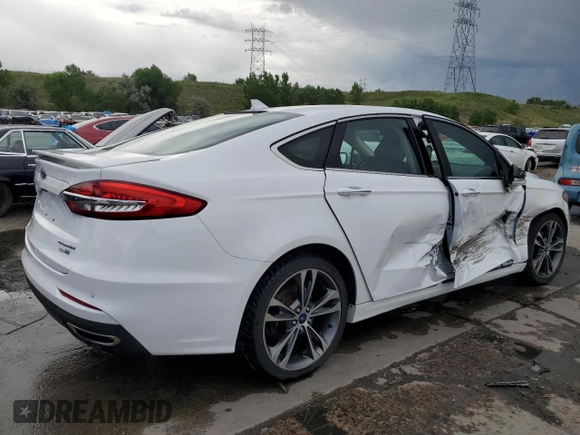 2020 Ford Fusion Titanium with VIN 3FA6P0D96LR175863, listed as a Copart auction lot 60570305 with 76,064 mi miles and Salvage title. Bid and sale history available at DreamBid. Image 3.