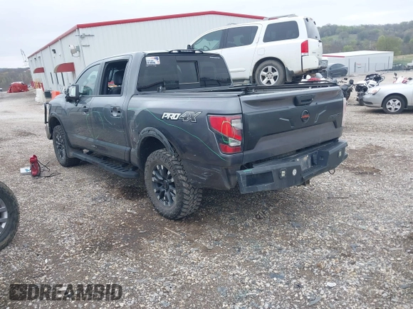 2021 Nissan Titan Pro-4X with VIN 1N6AA1ED3MN531332, listed as a IAAI auction lot 41918065 with 125,323 mi miles and . Bid and sale history available at DreamBid. Image 3.