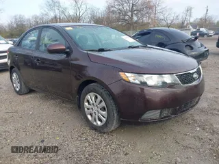 2011 Kia Forte EX with VIN KNAFU4A2XB5444513, listed as a IAAI auction lot 42002807 with 233,408 mi miles. Bid and sale history available at carsss.com. Image 1.