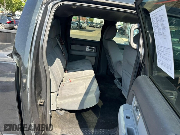 2011 Ford F-150 XLT with VIN 1FTFW1ET6BFB74527, listed as a Copart auction lot 56054535 with 197,177 mi miles and Clean Title. Bid and sale history available at carsss.com. Image 6.