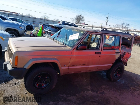 1999 Jeep Cherokee Sport with VIN 1J4FT68S7XL589206, listed as a IAAI auction lot 41411949 with 143,158 mi miles and . Bid and sale history available at DreamBid. Image 15.