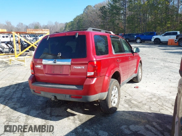 2008 Mazda Tribute Touring with VIN 4F2CZ96178KM16781, listed as a IAAI auction lot 41231644 with Not Provided miles and . Bid and sale history available at DreamBid. Image 4.