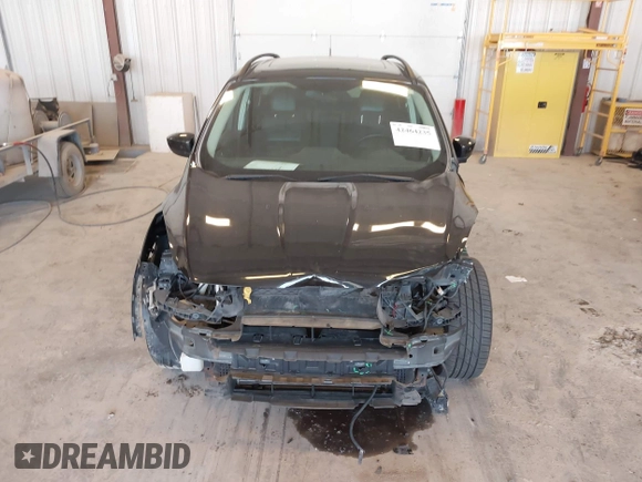 2014 Ford Escape SE with VIN 1FMCU9G95EUA16328, listed as a IAAI auction lot 42464235 with 108,570 mi miles and . Bid and sale history available at DreamBid. Image 12.