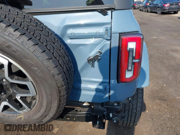2024 Ford Bronco Outer Banks z VIN 1FMDE8BH3RLB41205, wystawiony jako IAAI lot #42558633 z przebiegiem 1 457 mil mil oraz . Historia ofert i sprzedaży dostępna na DreamBid. Obrazek 6.